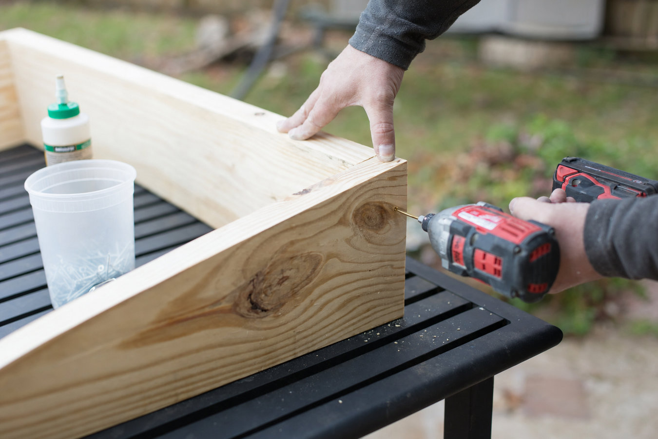 Pressure-treated wood deck construction